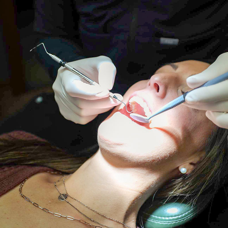Dental exam being performed on a patient